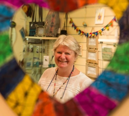 Happy woman looking into the camera